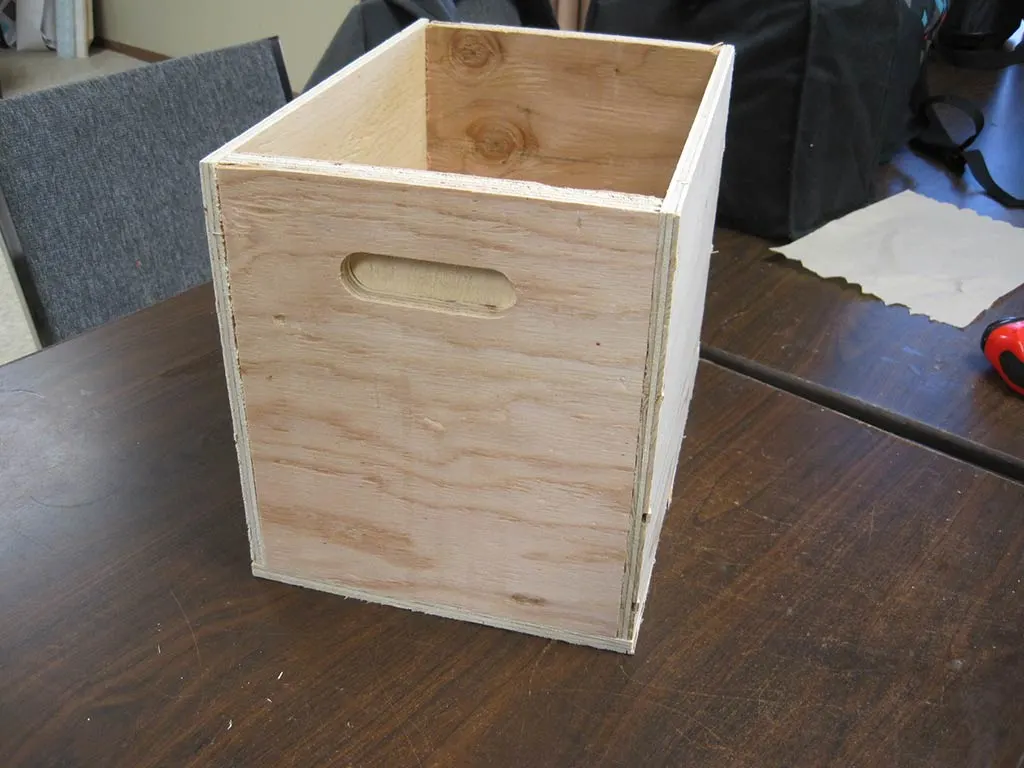 Close-up of a custom wood box on a table. Manufactured by 204 Pallet & Packaging in Winnipeg, Manitoba.