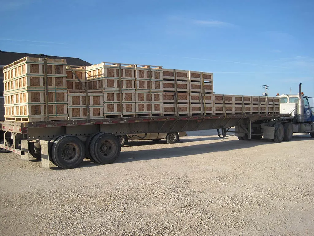 Truck carrying custom wooden boxes from 204 Pallet & Packaging in Winnipeg Manitoba.