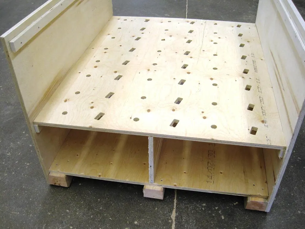 Custom wooden pallet crate with ventilation holes manufactured by 204 Pallet & Packaging in Manitoba for specialized shipping needs.